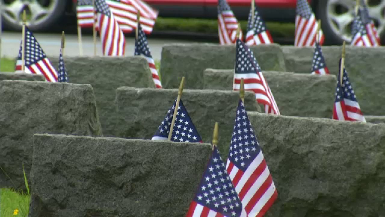 Flags at Forest Lawn Cemetery (Spectrum News 1)