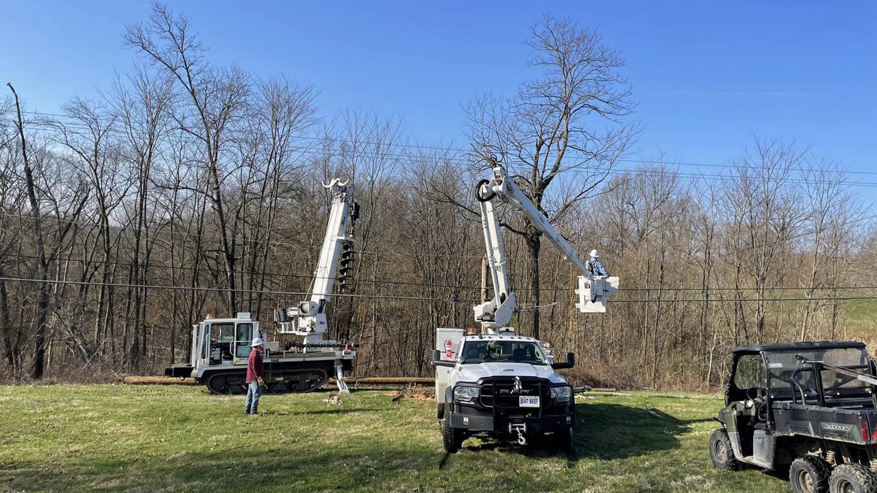 Co-op members with Fleming Mason Energy work to restore power on March 5, 2023 after severe storms tore through Kentucky on March 3. (Kentucky Electric Cooperatives/Wade Harris)