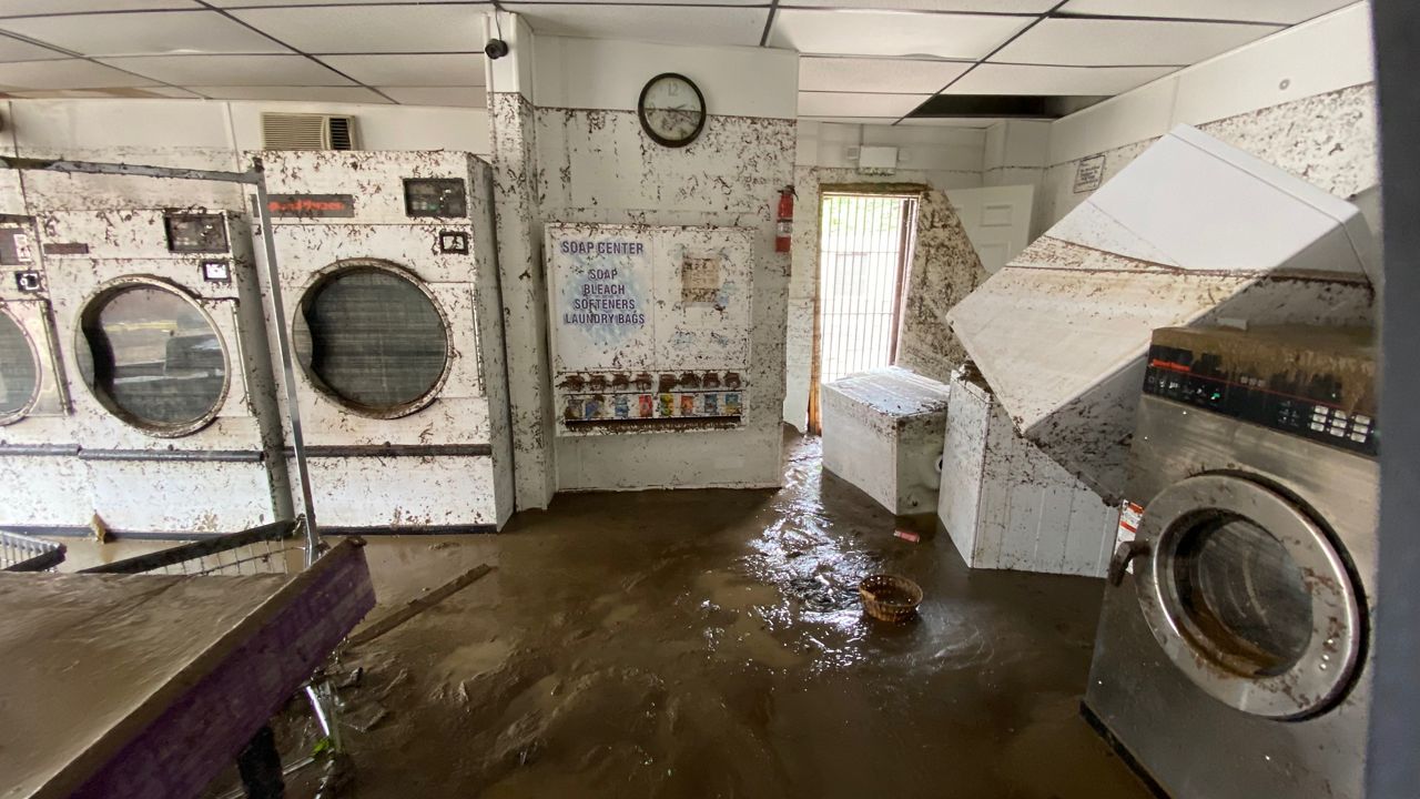 washing machine flooded house