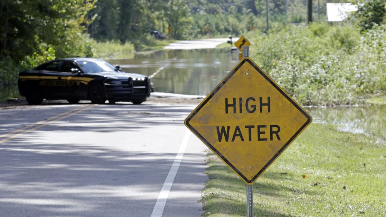 Flooding closes part of Stone Chimney Road In Supply, N.C., Tuesday, Sept. 17, 2024. 