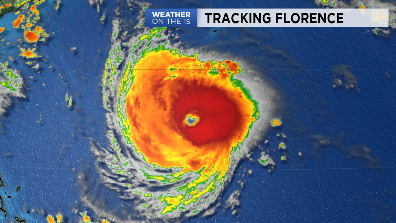 Florence continues to spin over the Atlantic as a strong category 4 hurricane.