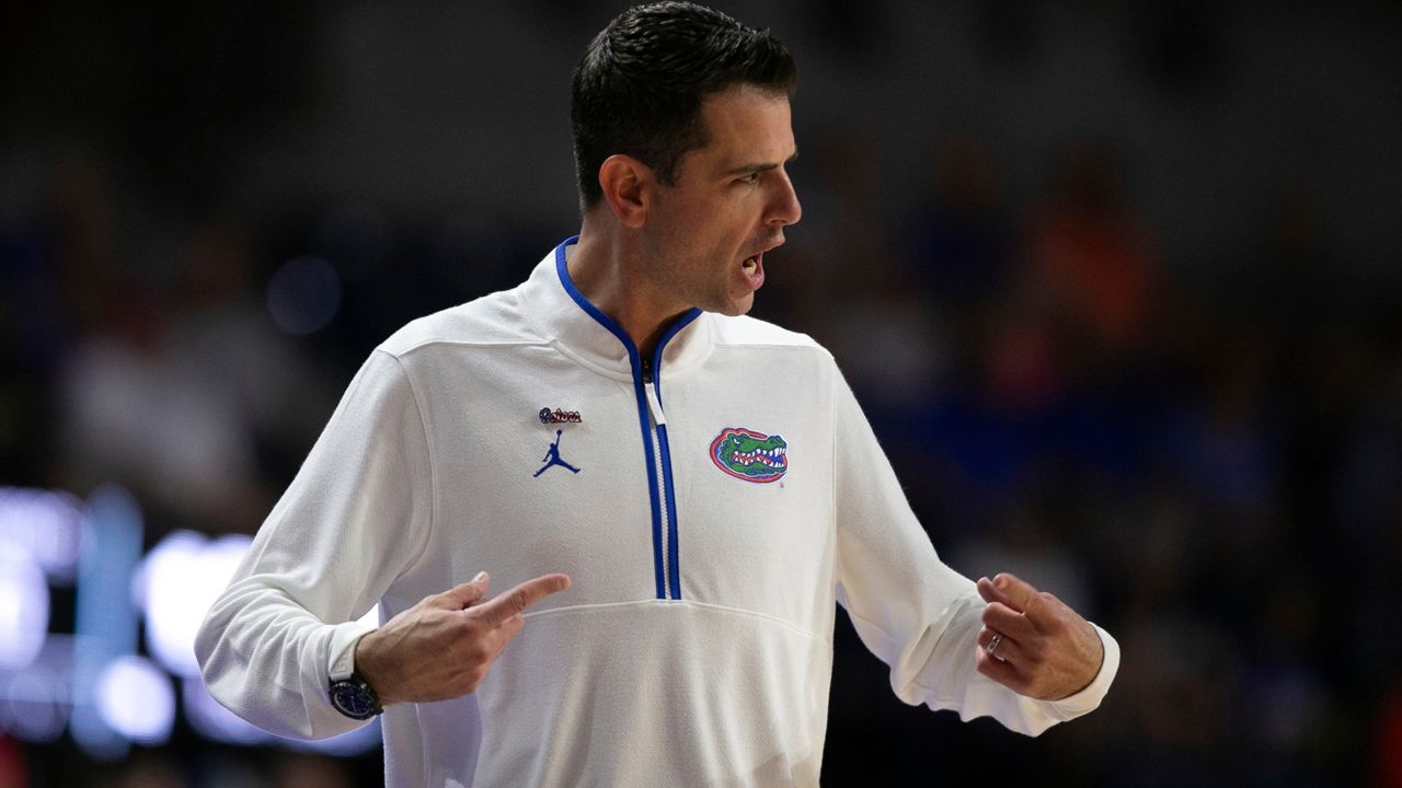 Florida coach Todd Golden, who is facing a Title IX investigation, shouts instructions to the Gators against Grambling State o Monday, Nov. 11, 2024. (AP Photo/Alan Youngblood)