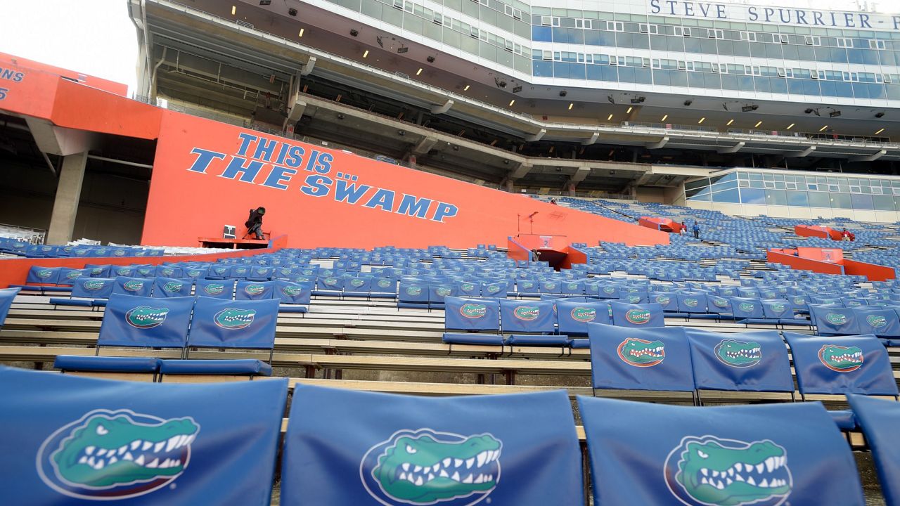 Florida Gator seat backs sit in the stands of Ben Hill Griffin Stadium before an NCAA college football game against North Texas in Gainesville, Fla., Saturday, Sept. 17, 2016. (AP Photo/Phelan M. Ebenhack)