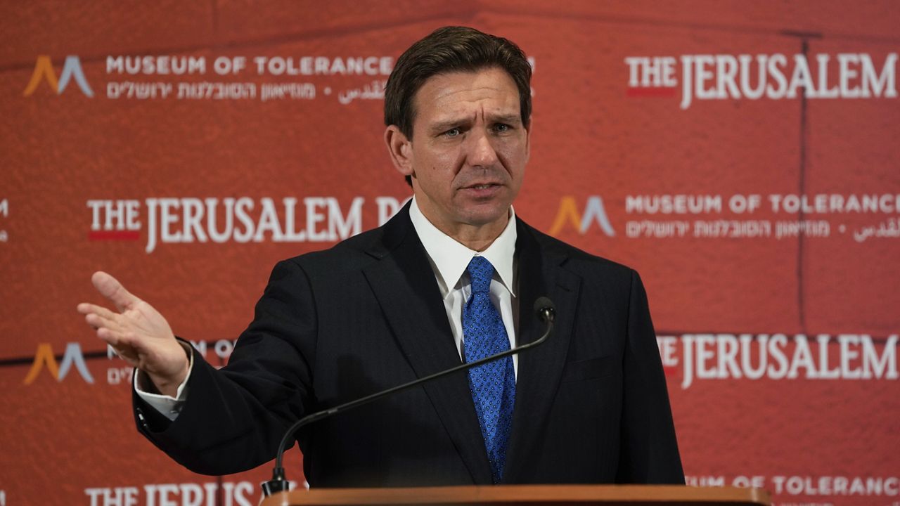 Florida Gov. Ron DeSantis talks to the media at a conference titled "Celebrate the Faces of Israel" at Jerusalem's Museum of Tolerance, Thursday, April 27, 2023. (AP Photo/Maya Alleruzzo)