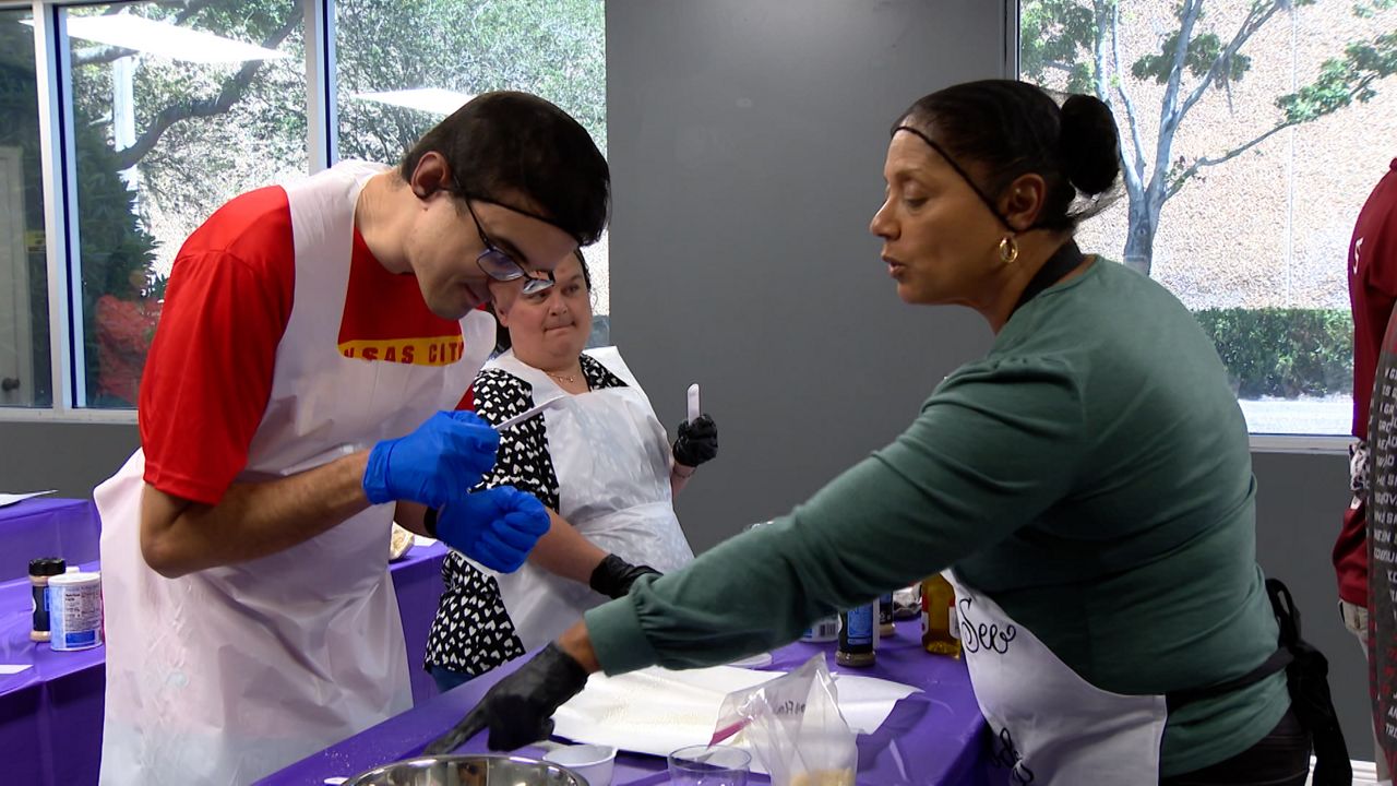 Vivian Potter works out of the Orlando Kitchen Incubator and offers a daily cooking class that helps empower special needs adults with transferable skills. (Spectrum News/Philip Petersen)