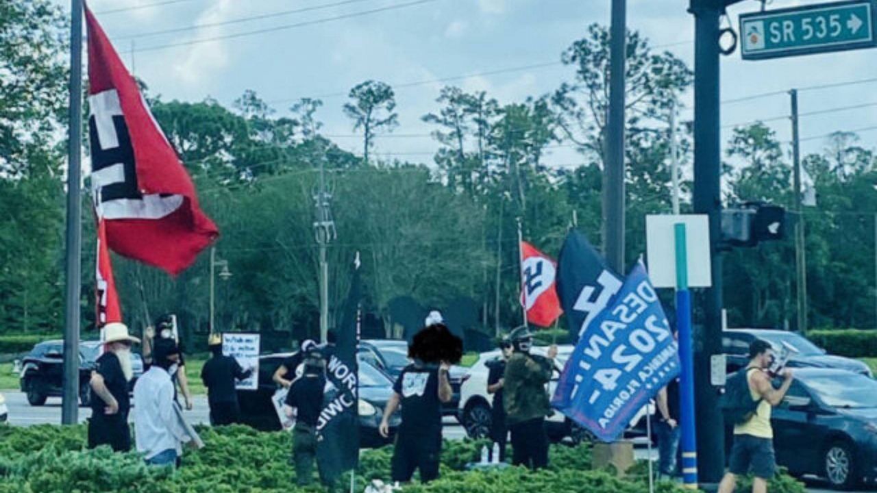 MomsDemand founder Shannon Watts said in a post on her Twitter page that "two dozen white supremacists" were outside the main Disney World entrance in Orlando "with signs featuring Gov. DeSantis’s face, swastikas, the n-word and homophobic slurs.” (Photo: Shannon Watts)