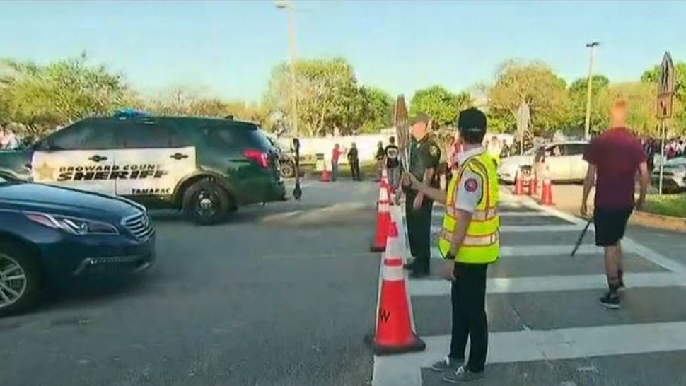 Students wary, hopeful, on return to site of school shooting