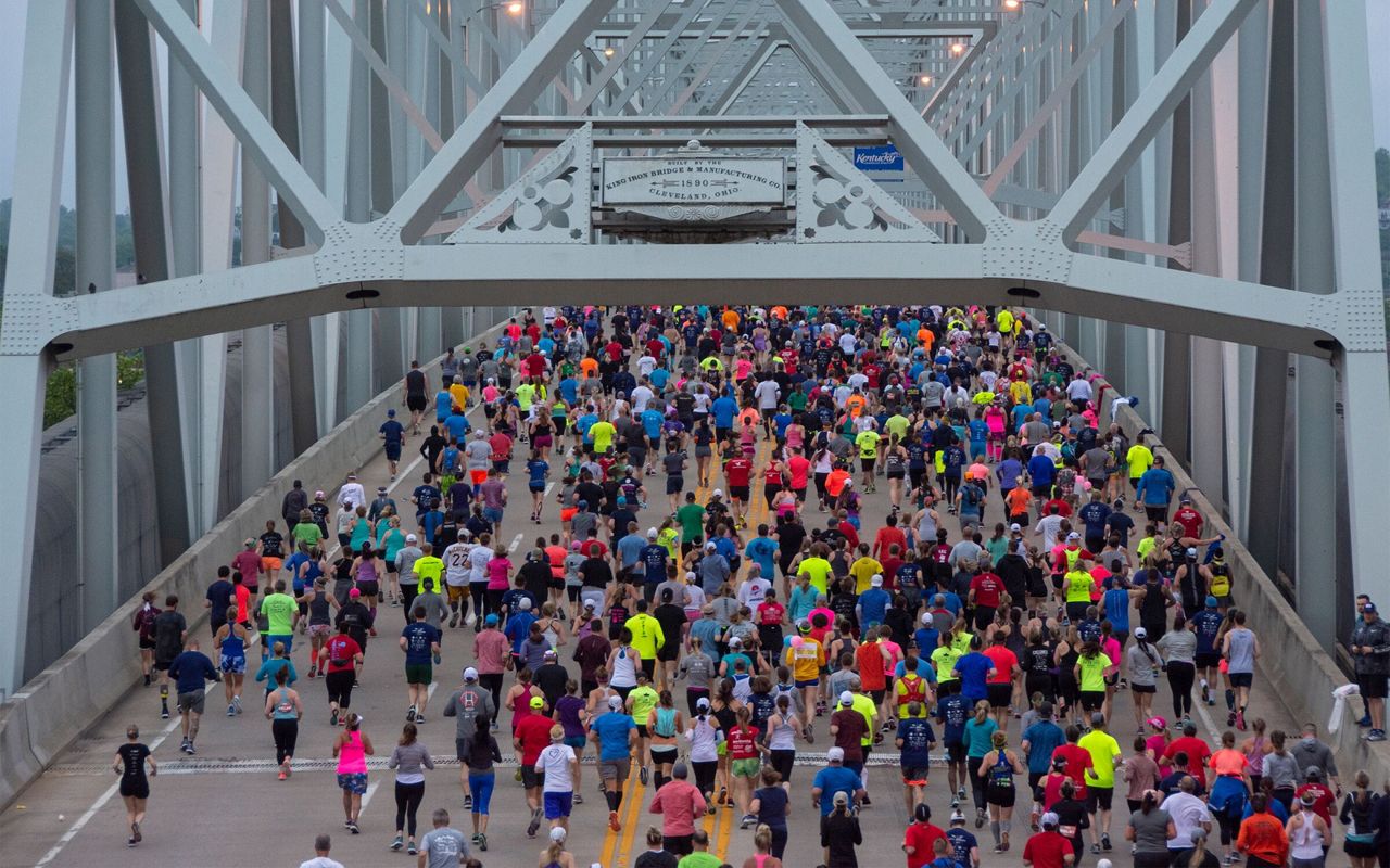Runners cross a bridge spanning the Ohio River between Cincinnati and Northern Kentucky during the Flying Pig Marathon. (Shae Combs/Game Day)