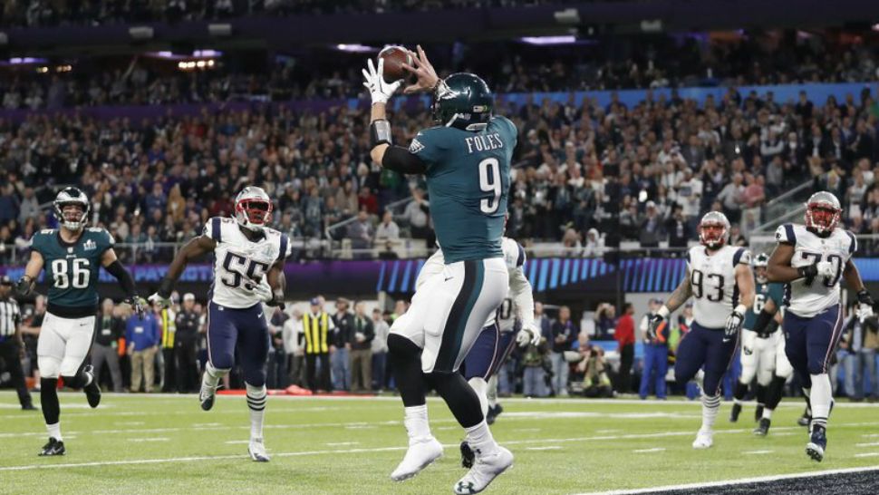 Philadelphia Eagles’ Nick Foles catches a touchdown pass during the first half of the NFL Super Bowl 52 football game against the New England Patriots Sunday, Feb. 4, 2018 in Minneapolic. (AP Photo/Jeff Roberson)