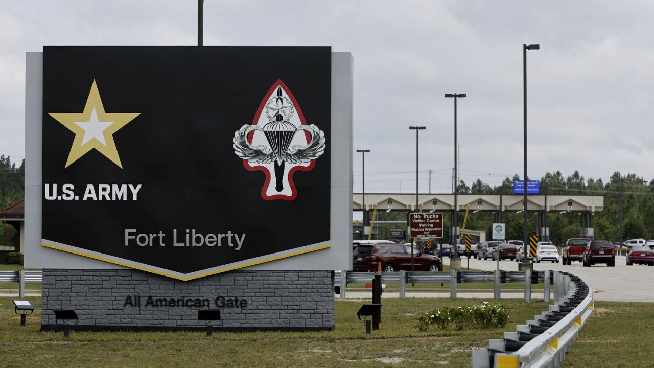 FILE - The new Fort Liberty sign is displayed outside the base on Friday, June 2, 2023 in Fort Liberty, N.C. U.S. special operations commanders are having to do more with less and they're learning from the war in Ukraine, That means juggling how to add more high-tech experts to their teams while still cutting their overall forces by about 5,000 troops over the next five years. (AP Photo/Karl B DeBlaker, File)