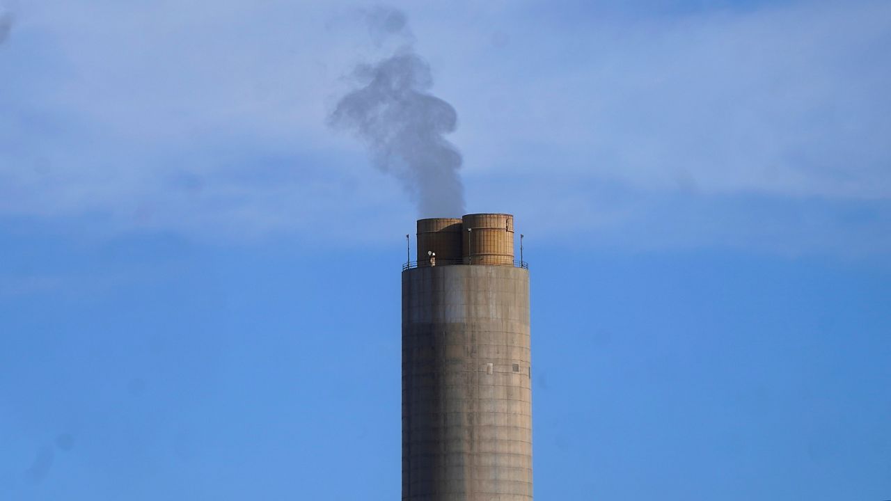 A smokestack stands at a coal plant on Wednesday, June 22, 2022, in Delta, Utah. (AP Photo/Rick Bowmer, File)