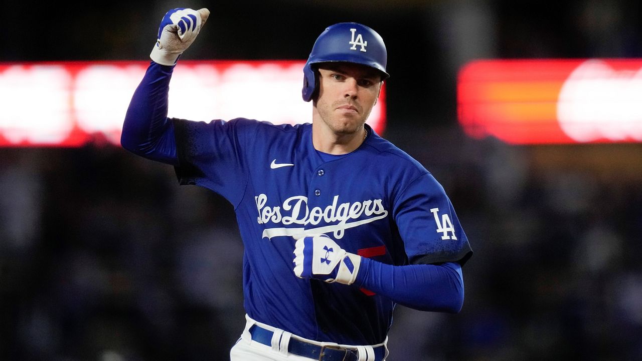 Freeman has 3 hits to lead Dodgers to 8-2 victory