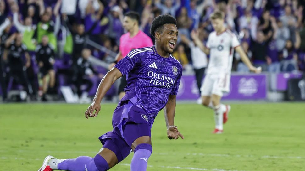 Orlando City defender Alex Freeman (30) reacts to scoring against Toronto FC during the first half of a MLS soccer match, Saturday, March 1, 2025, in Orlando, Fla. (AP Photo/Kevin Kolczynski)