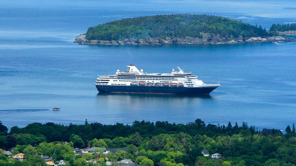 he Maasdam, a 1258-passenger cruise ship, sits at anchor in Frenchman's Bay off Bar Harbor in 2010. A recent study found the bay was polluted with microplastics. (AP Photo/Robert F. Bukaty, File)