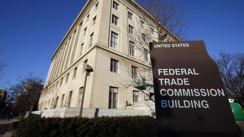 The Federal Trade Commission building, Jan. 28, 2015, in Washington. Parents whose kids bought virtual gear without their knowledge on the popular Fortnite video game could soon be able to get a refund. The U.S. regulators are starting to notify more than 37 million people by email that they may be eligible for compensation as part of a legal settlement with Fortnite’s maker, Epic Games Inc. (AP Photo/Alex Brandon, File)