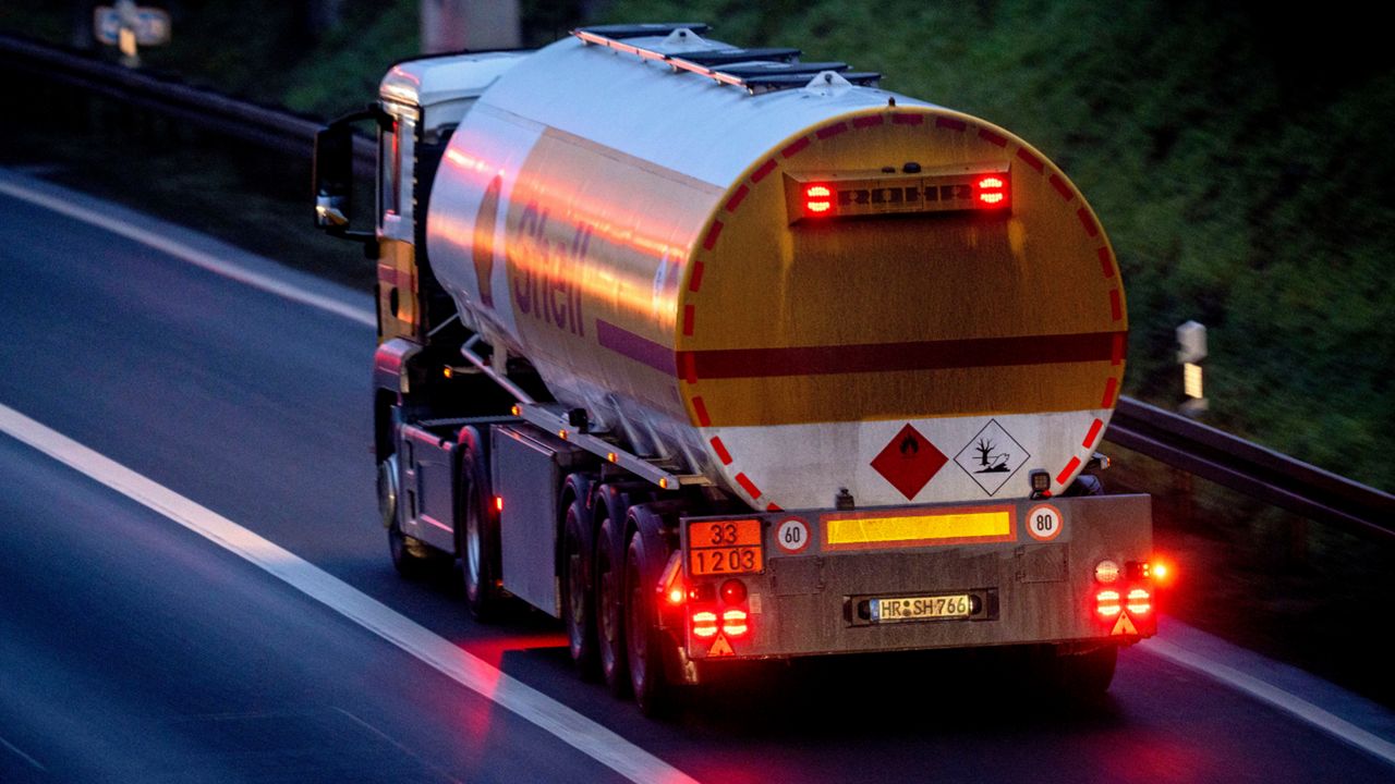 A fuel truck drives along a highway. (AP Photo/Michael Probst, File)