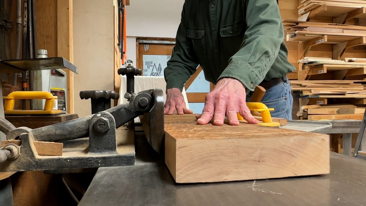 WNY shop owner teaching furniture restoration