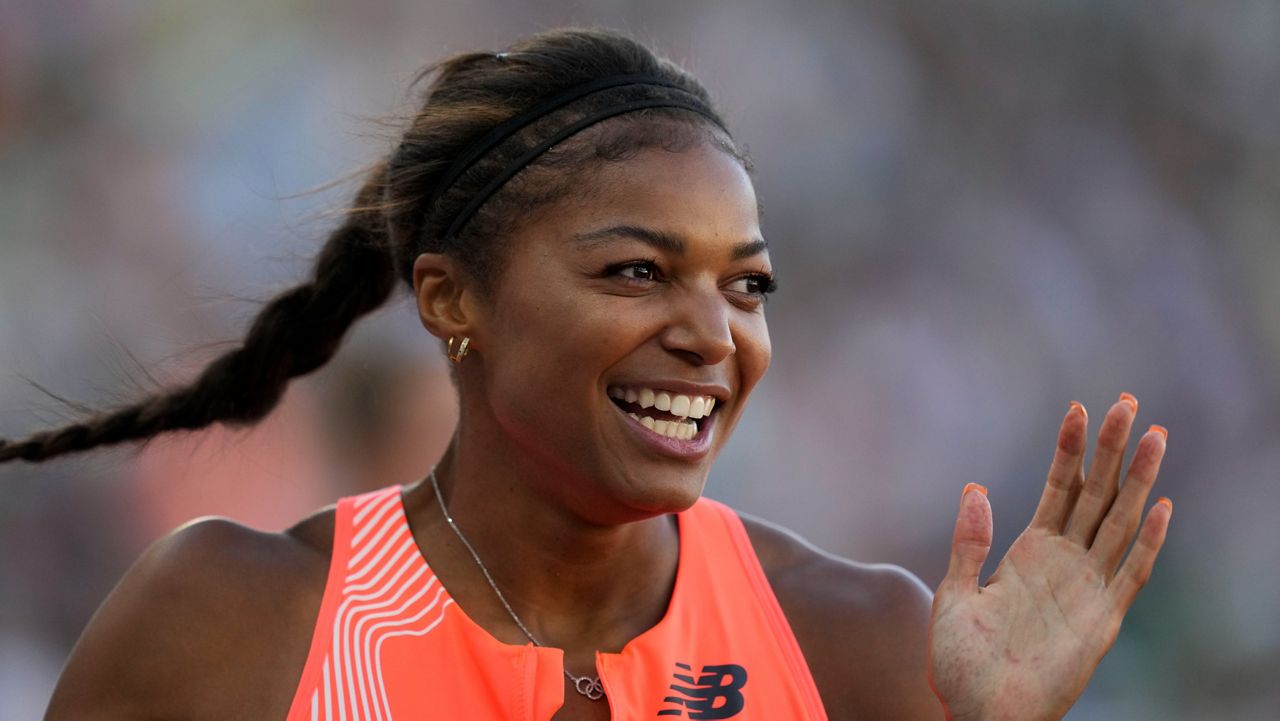 Gabby Thomas reacts after winning the women's 200 meters final during the U.S. track and field championships in Eugene, Ore., Sunday, July 9, 2023. (AP Photo/Ashley Landis)