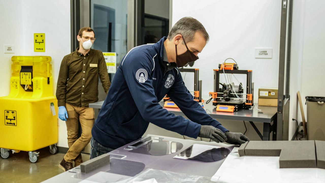 Los Angeles Mayor Eric Garcetti at USC Iovine and Young Academy where they are 3D printing materials for medical workers (Courtesy Office of Mayor Garcetti)