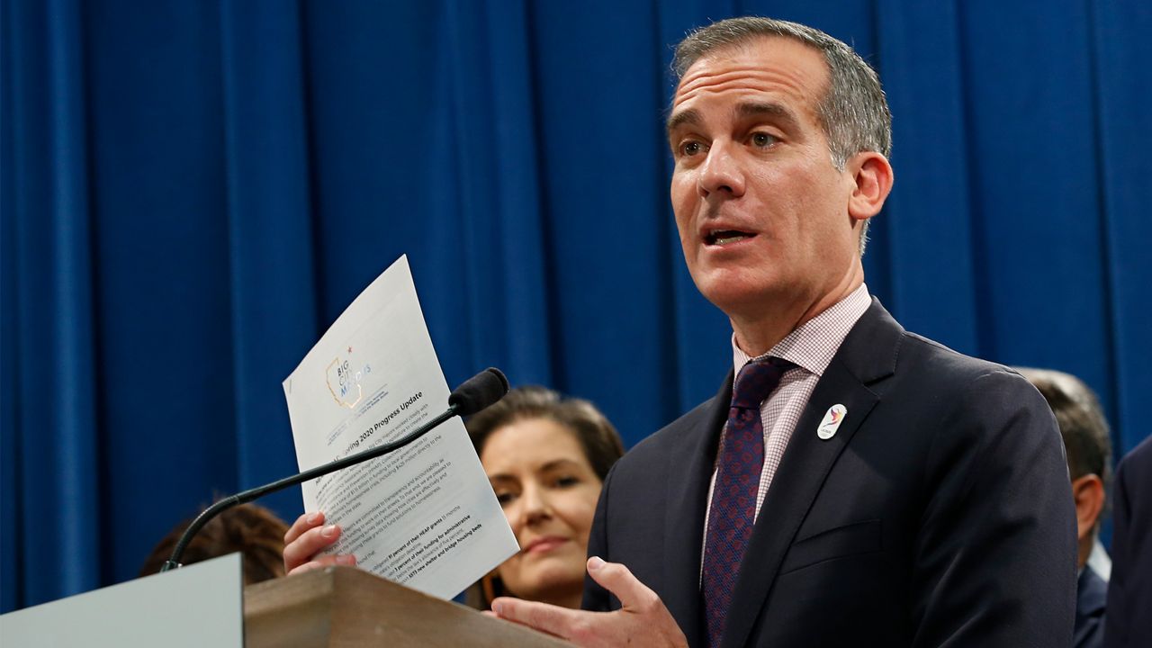 Los Angeles Mayor Eric Garcetti, discusses the meeting concerning the state's homeless situation he and other mayors of some of California's largest cities had with Gov. Gavin Newsom at the Capitol in Sacramento, Calif., Monday, March 9, 2020. (AP Photo/Rich Pedroncelli)