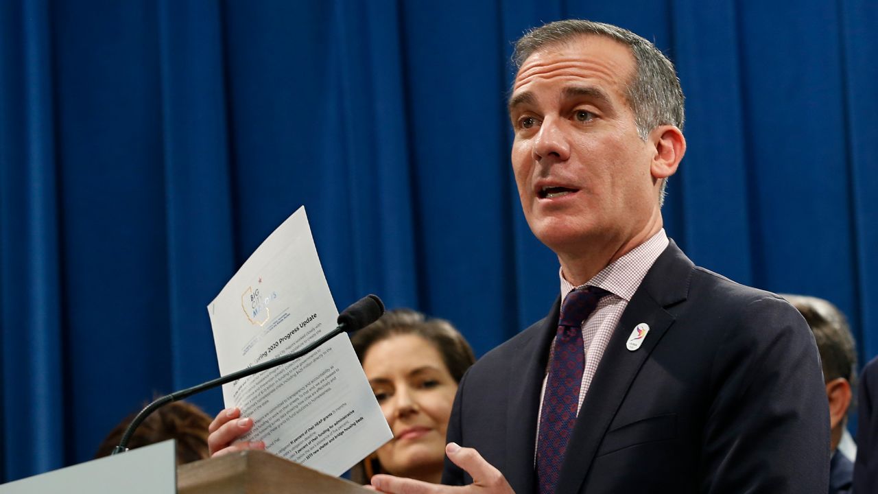 Los Angeles Mayor Eric Garcetti, discusses the meeting concerning the state's homeless situation he and other mayors of some of California's largest cities had with Gov. Gavin Newsom at the Capitol in Sacramento, Calif., Monday, March 9, 2020. (AP Photo/Rich Pedroncelli)