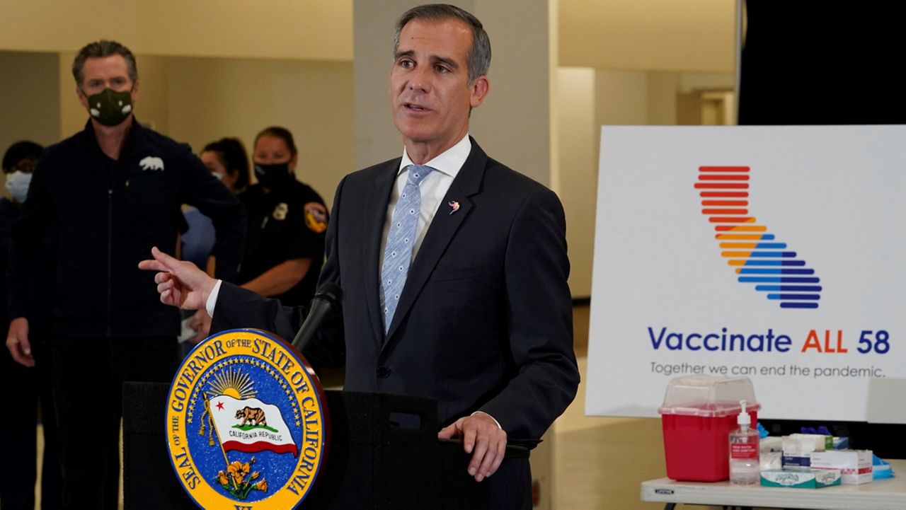 In this April 1, 2021, file photo, Los Angeles Mayor Eric Garcetti addresses questions about the COVID-19 vaccines at the Baldwin Hills Crenshaw Plaza in Los Angeles. (AP Photo/Damian Dovarganes, File)