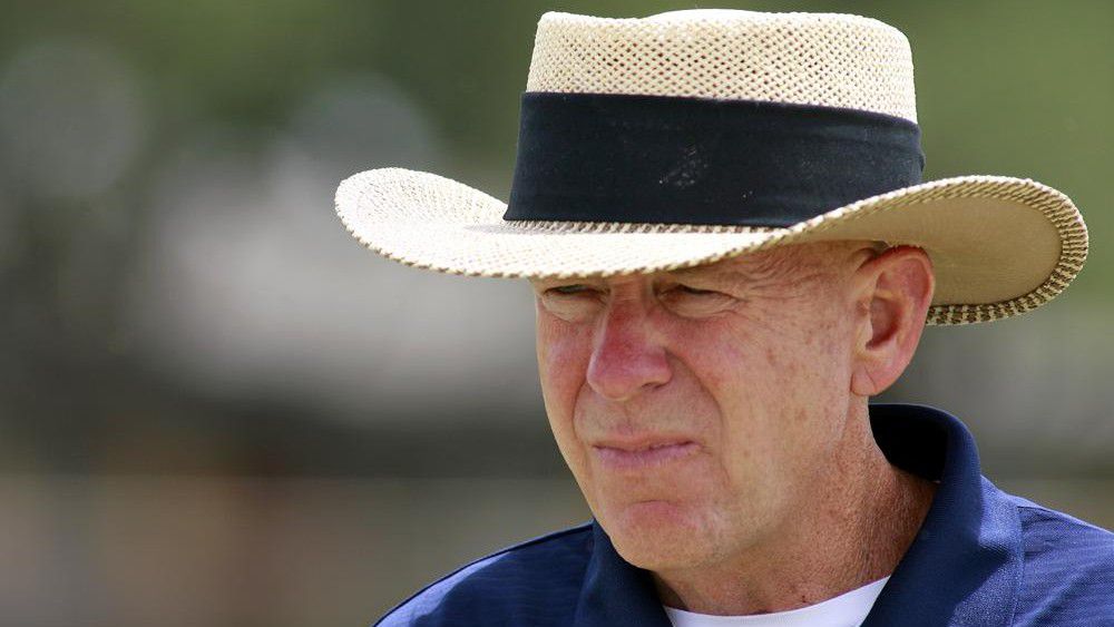 Odessa Permian head coach Gary Gaines walks off the practice field after a high school football workout in Odessa, Texas, May 21, 2009. Gaines, coach of the Texas high school football team made famous in the book and movie “Friday Night Lights,” has died. He was 73. Gaines’ family says the former coach died in Lubbock after a long battle with Alzheimer’s disease. (AP Photo/Kevin Buehler, File)