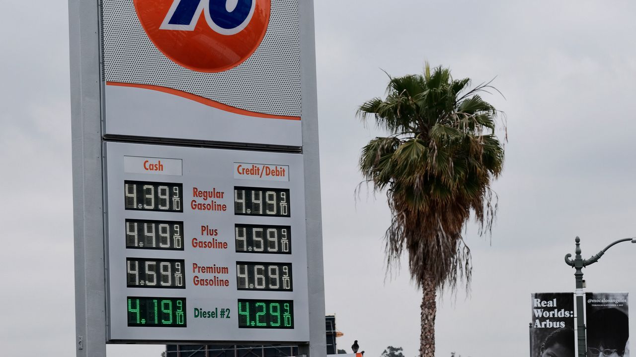Gasoline prices are displayed atop a 76 Station near downtown Los Angeles on Friday, May 18, 2018. (AP Photo/Richard Vogel)
