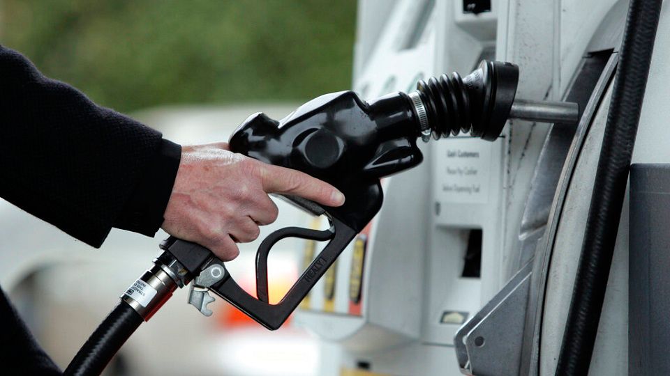 A Shell gas station customer pumps gas in Menlo Park, Calif., Wednesday, Dec. 2, 2009. Oil prices dipped Wednesday with more evidence that the country is using less energy while oil and gasoline supplies continue to grow. (AP Photo/Paul Sakuma)