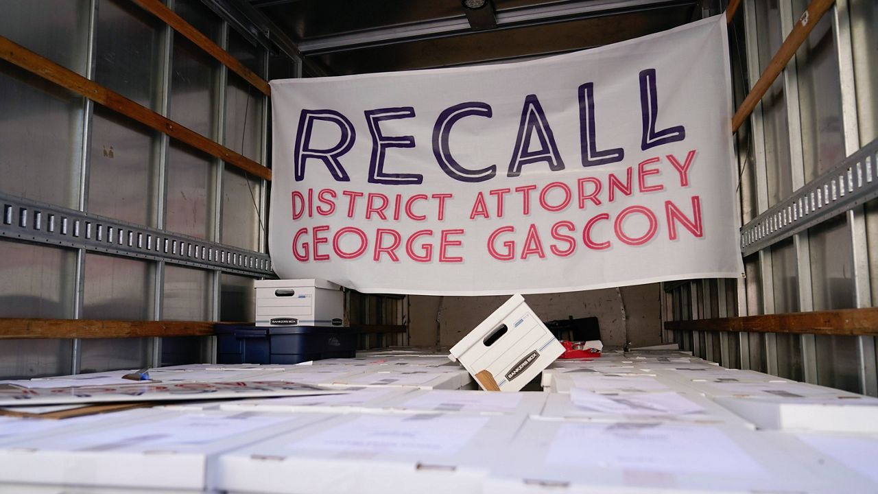 Boxes full of petitions to recall Los Angeles County District Attorney George Gascon sit in a truck outside the Los Angeles County Registrar of Voters on July 6, 2022, in Norwalk, Calif. (AP Photo/Ashley Landis)