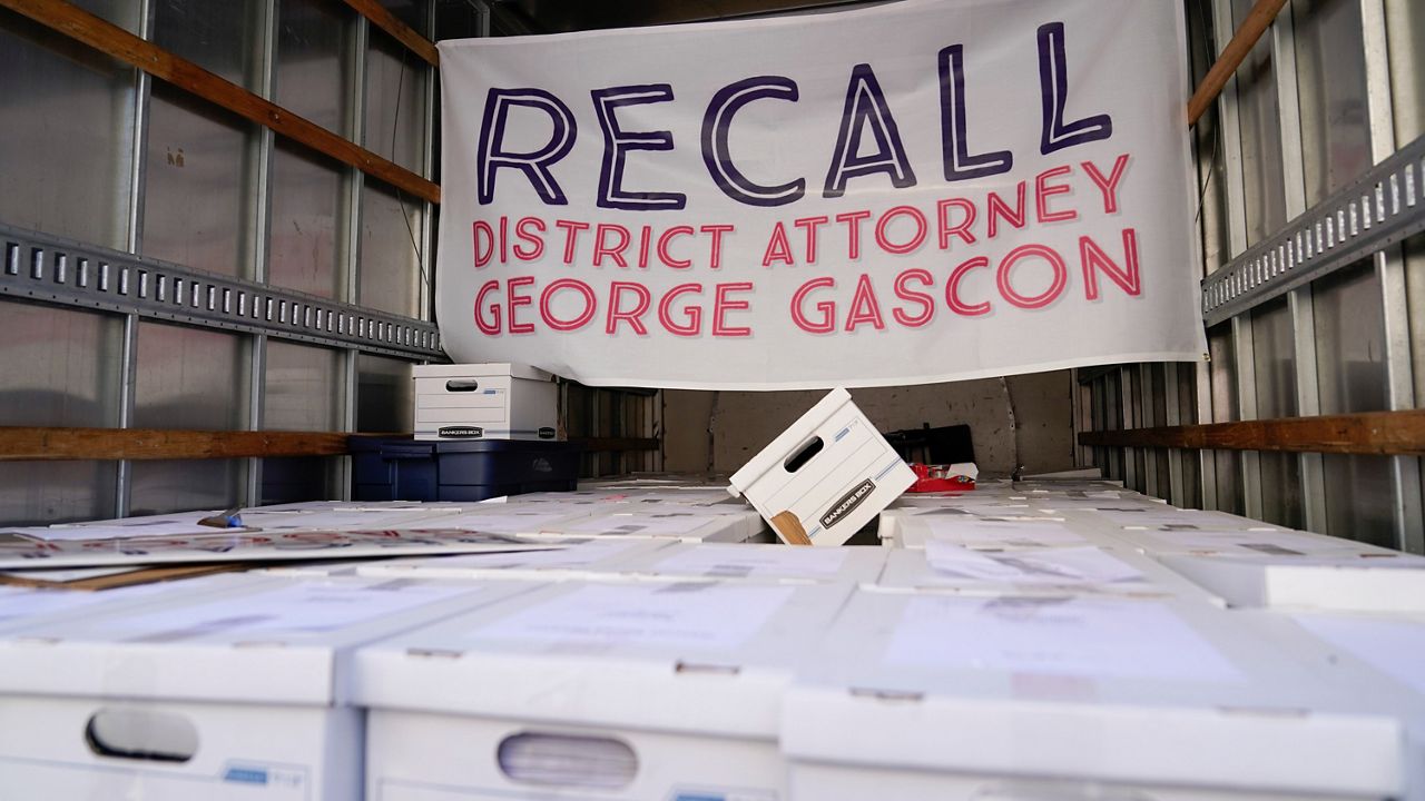 Boxes full of petitions to recall Los Angeles County District Attorney George Gascon sit in a truck outside the Los Angeles County Registrar of Voters on July 6, 2022, in Norwalk, Calif. (AP Photo/Ashley Landis)
