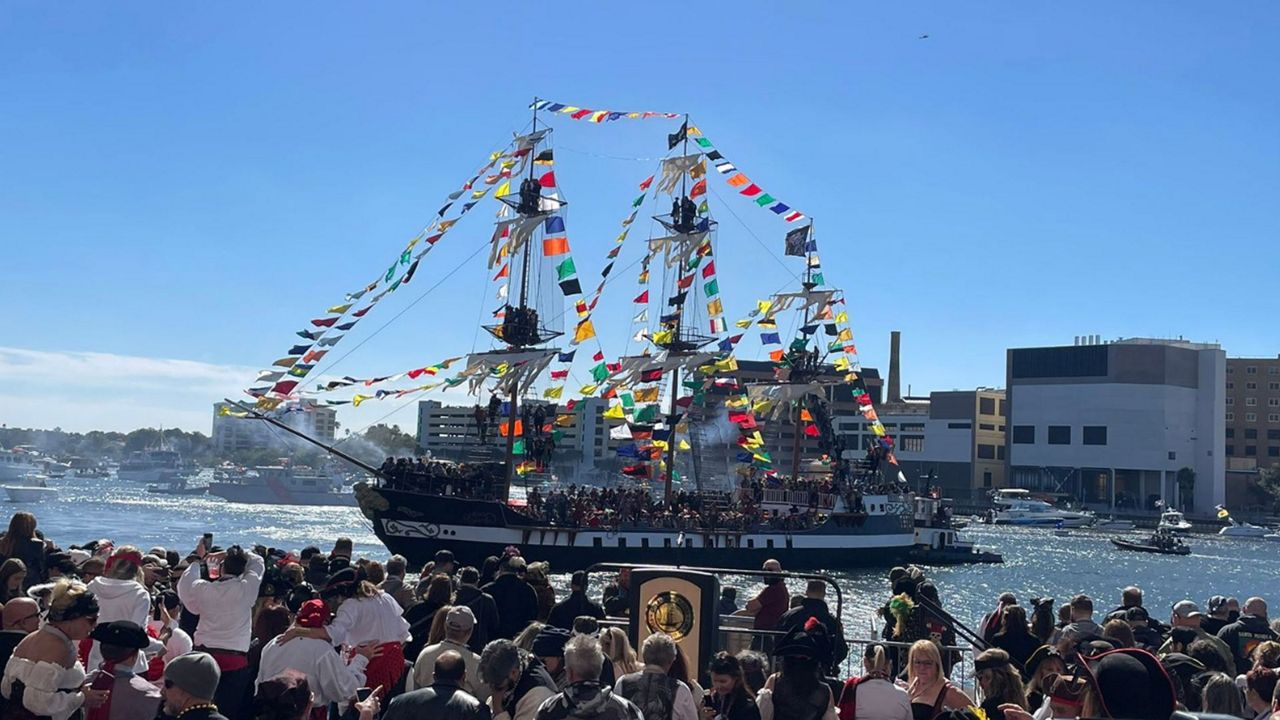 Parade-goers view the José Gasparilla, a specially built “pirate ship” equipped with mini cannons that fire off throughout the Gasparilla journey through downtown Tampa. (Spectrum News)