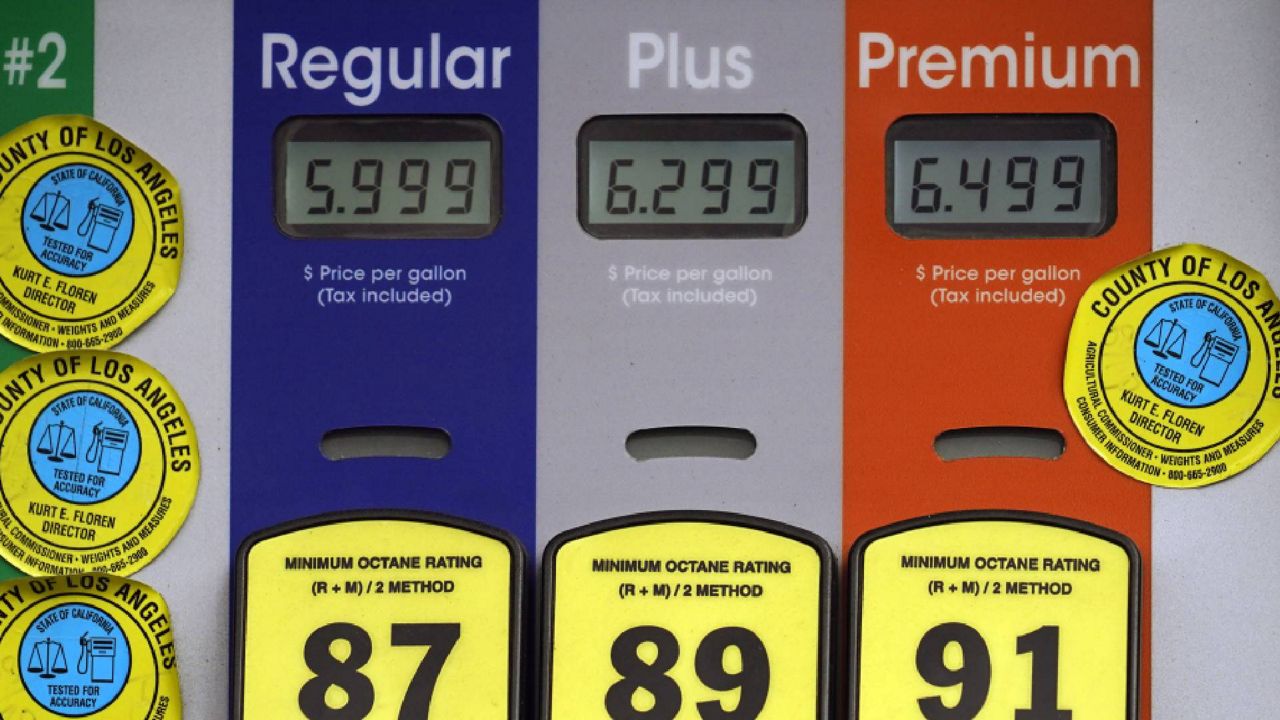 High gas prices are posted at a full service gas station in Beverly Hills, Calif., Sunday, Nov. 7, 2021. (AP Photo/Damian Dovarganes)