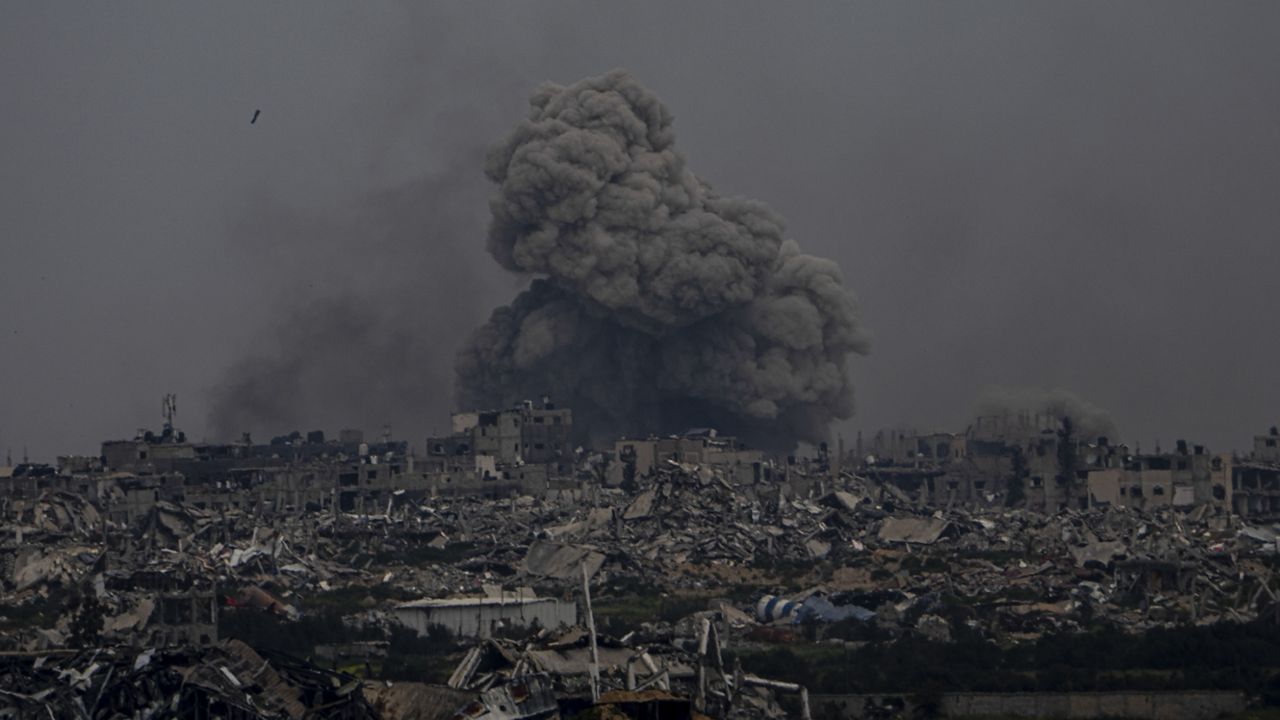 Smoke and explosions rise inside the Gaza Strip, as seen from southern Israel, Sunday, Sunday, March 17, 2024. (AP Photo/Ariel Schalit)