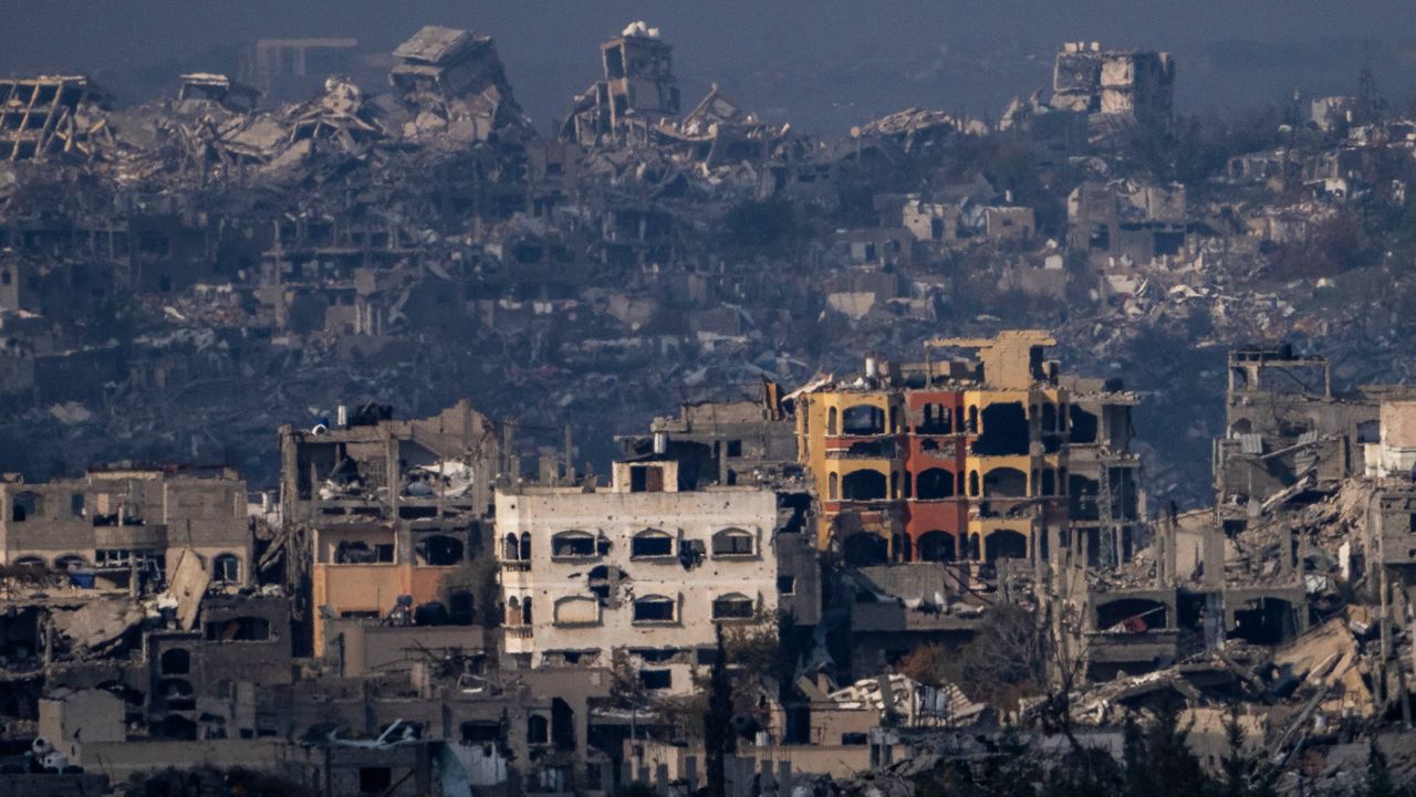 Destroyed buildings by Israeli bombardments as seen inside the Gaza Strip from southern Israel, Thursday, Jan. 16, 2025. (AP Photo/Ariel Schalit)