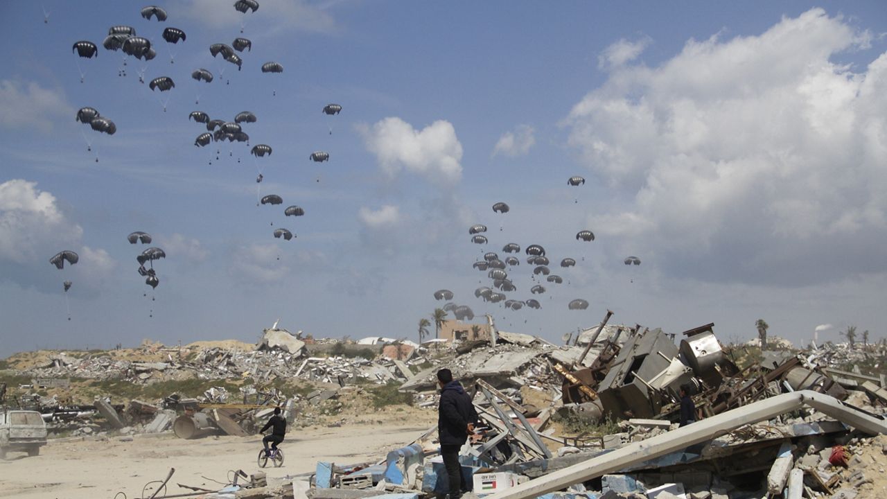 Humanitarian aid is airdropped to Palestinians over Gaza City, Gaza Strip, Monday, March 25, 2024. (AP Photo/Mahmoud Essa)