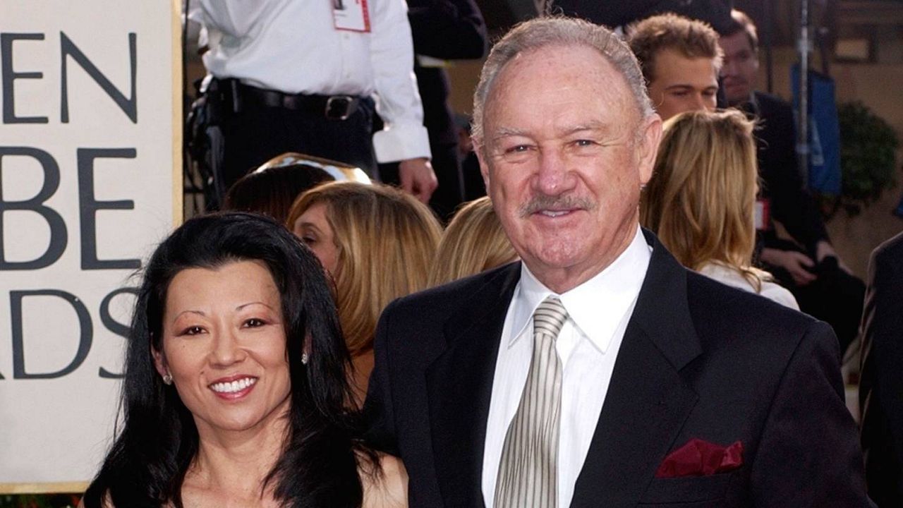 Actor Gene Hackman arrives with his wife, Betsy Arakawa, for the 60th Annual Golden Globe Awards in Beverly Hills, Calif., Jan. 19, 2003. (AP Photo/Mark J. Terrill)