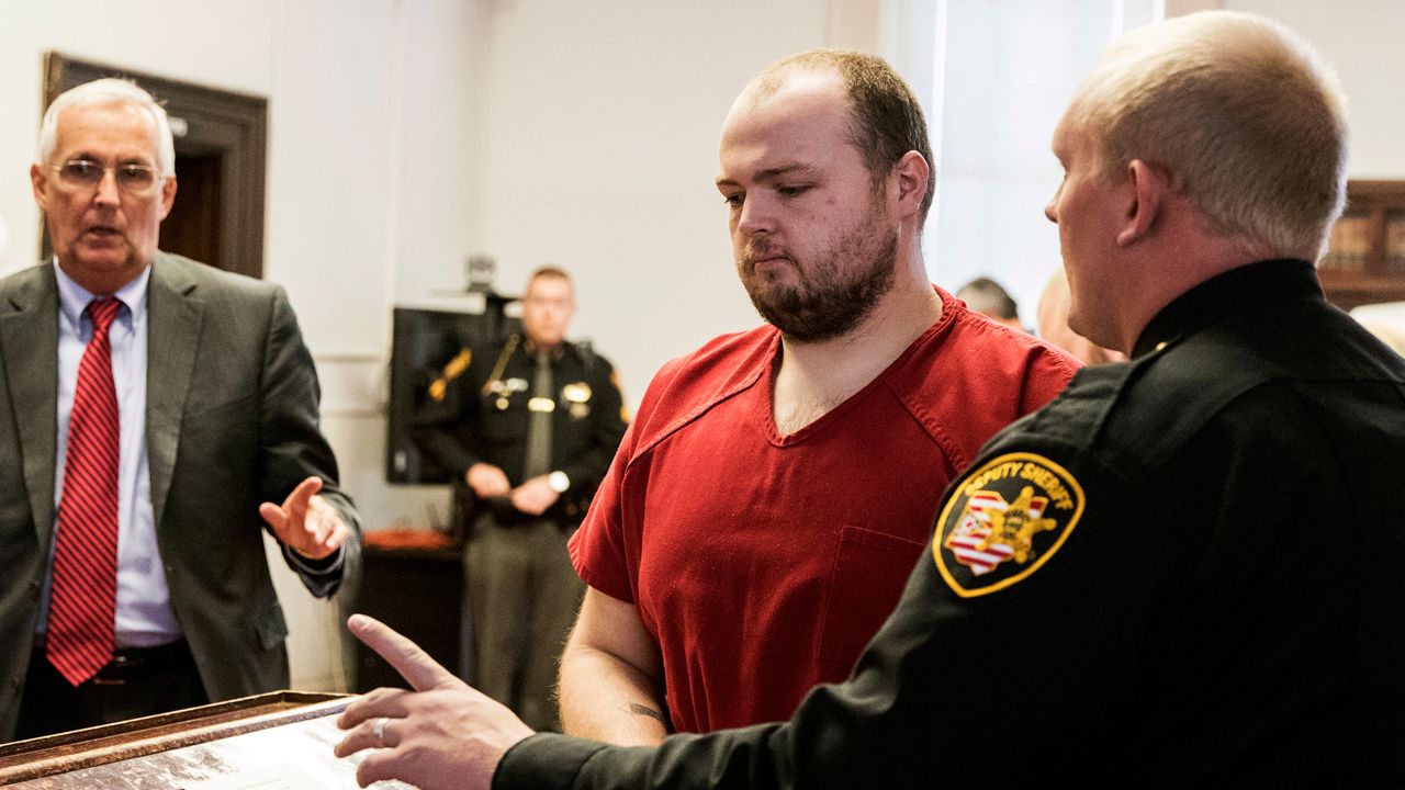 George Wagner IV, center, is escorted out of the courtroom after his arraignment on Nov. 28, 2018, at the Pike County Courthouse, in Waverly, Ohio. (Robert McGraw/The Chillicothe Gazette via AP, Pool, File)