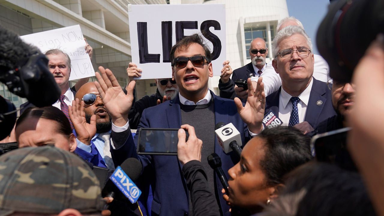 Rep. George Santos, R-N.Y., leaves the federal courthouse in Central Islip, N.Y., Wednesday May 10, 2023. (AP Photo/Seth Wenig)