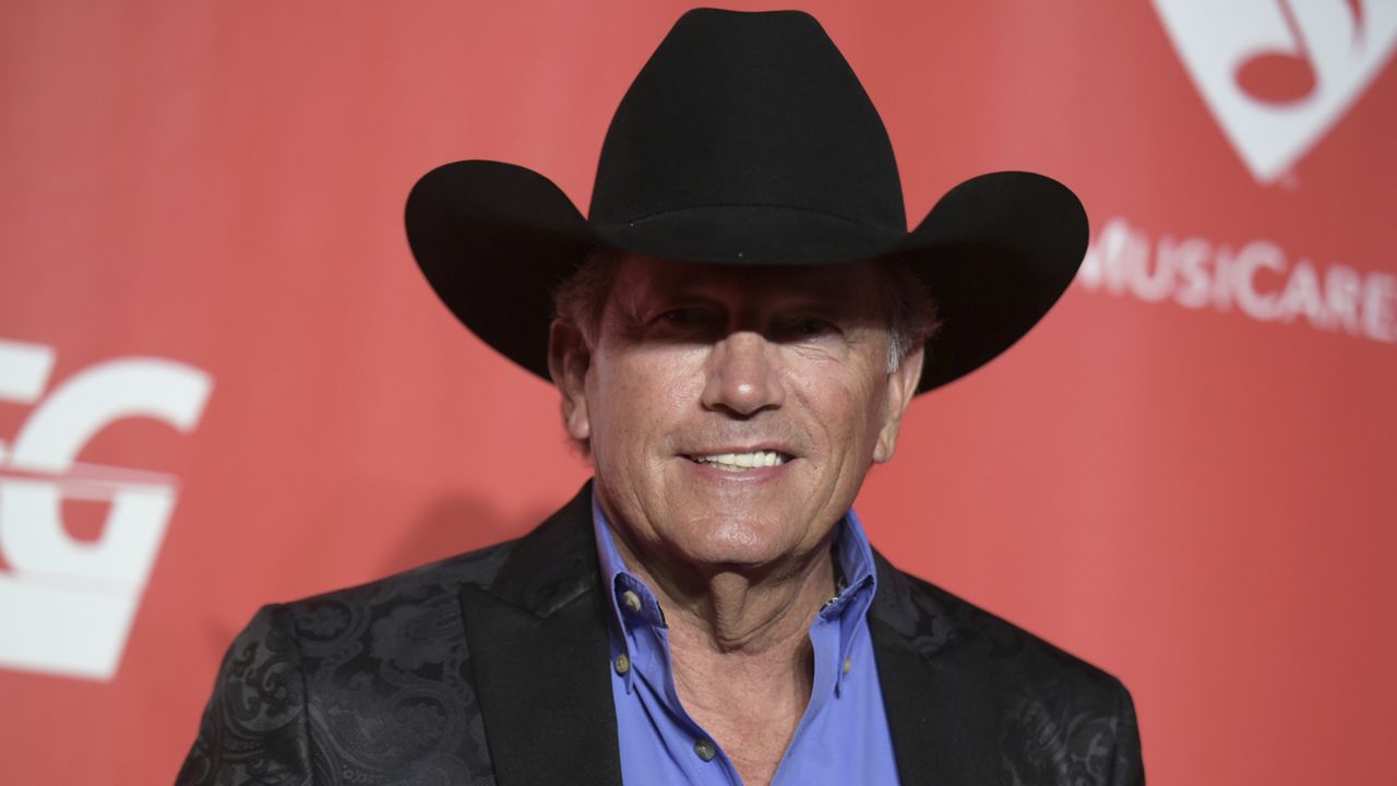 George Strait arrives at the MusiCares Person of the Year tribute honoring Tom Petty at the Los Angeles Convention Center on Friday, Feb. 10, 2017. (Photo by Richard Shotwell/Invision/AP)