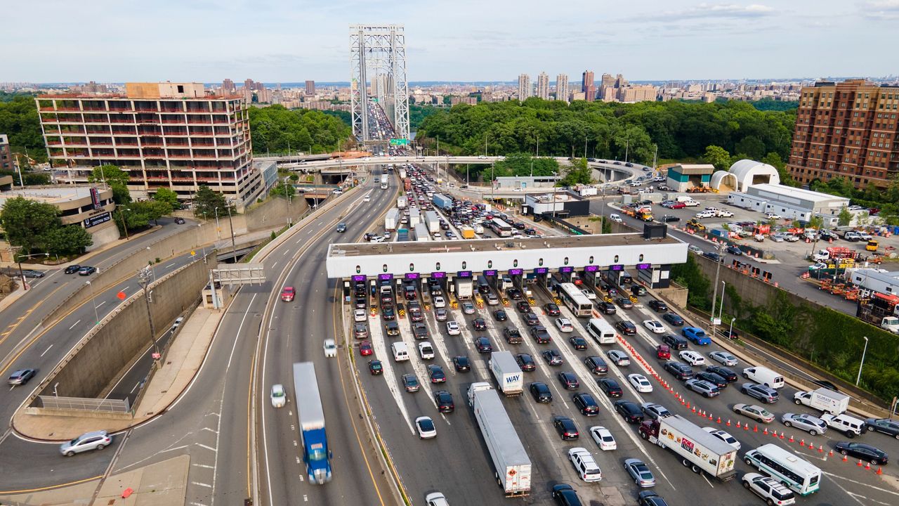 Traffic passes through the toll plaza at the George Washington Bridge in New Jersey on Friday, June 10, 2022.