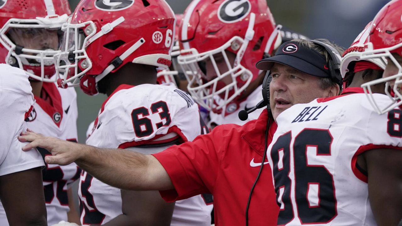 Georgia head coach Kirby Smart gives instruction to his players in the second half of an NCAA college football game against Vanderbilt, Saturday, Oct. 14, 2023, in Nashville, Tenn. (AP Photo/George Walker IV)