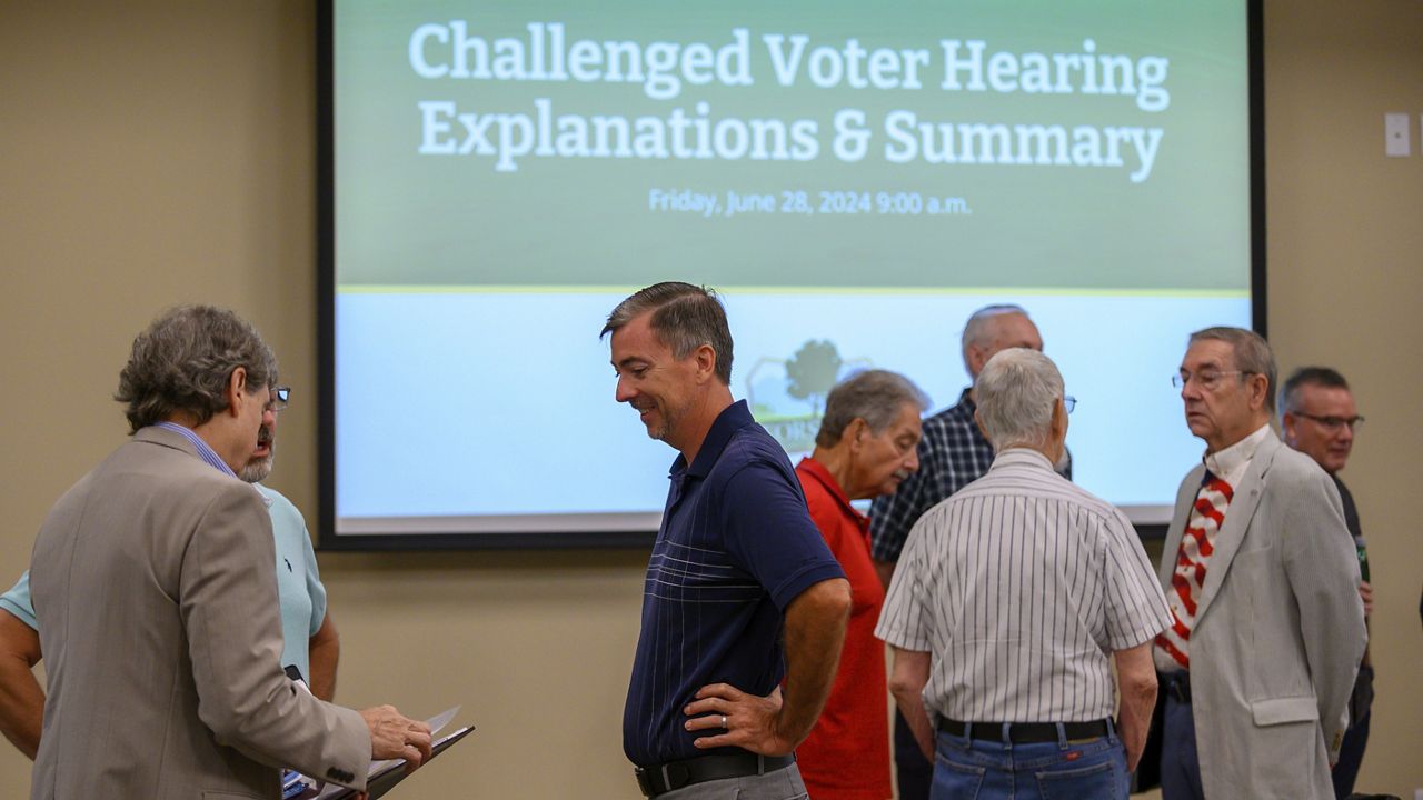 Forsyth election board considers challenges to the eligibility of 800 voters at the Forsyth County Voter Registrar in Cumming, Ga., June 28, 2024. (Jamie Spaar/Atlanta Journal-Constitution via AP)