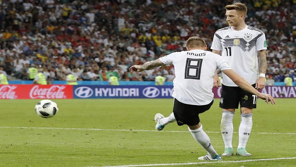 Germany’s Toni Kroos, left, scores his side’s second goal during the group F match between Germany and Sweden at the 2018 soccer World Cup in the Fisht Stadium in Sochi, Russia, Saturday, June 23, 2018. (AP Photo/Frank Augstein)