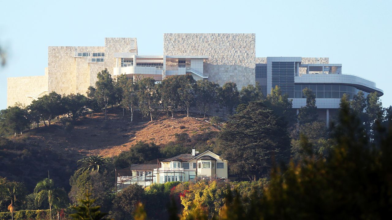 The Getty Center is seen after a wildfire swept through Los Angeles' Bel Air neighborhood Wednesday, Dec. 6, 2017. The Getty Center, the $1 billion home to the J. Paul Getty Museum and related organizations, stands on the west side of Sepulveda Pass. (AP Photo/Reed Saxon)