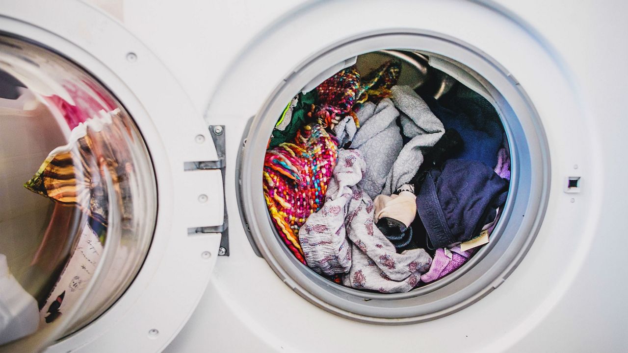 Stock image of laundry sitting in a dryer. (Getty Images)