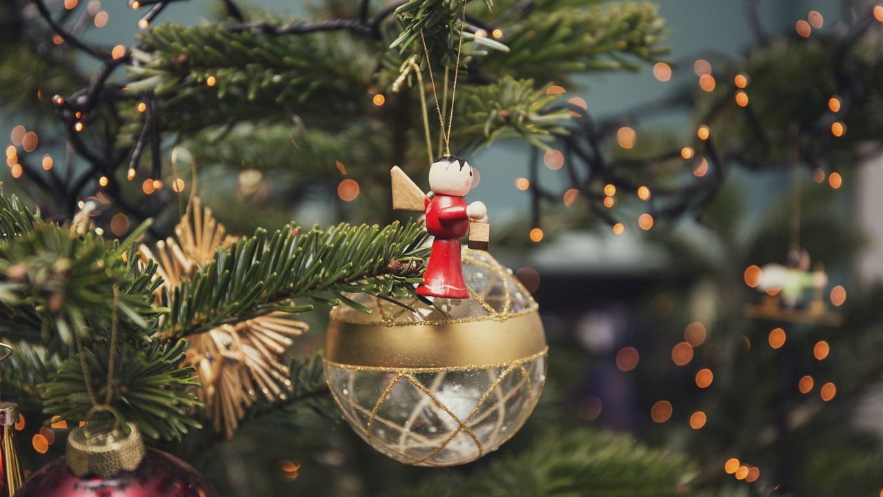 Christmas ornament hanging from a tree. (Christina Reichl Photography/Getty Images)