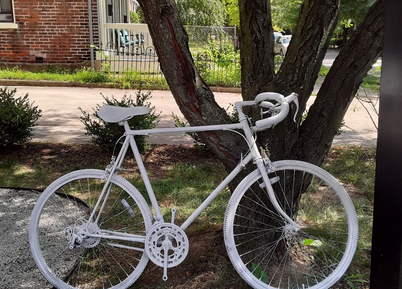 A ghost bike set up at Roebling Books and Coffee in honor of Gloria San Miguel. (Photo courtesy of Emily Webster)