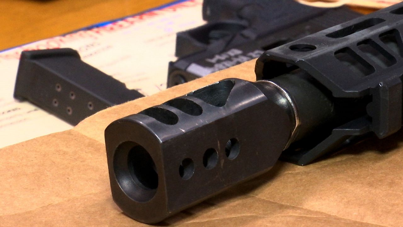 In this photo taken Wednesday, Nov. 27, 2019, are "ghost guns" on display at the headquarters of the San Francisco Police Department in San Francisco. (AP Photo/Haven Daley)