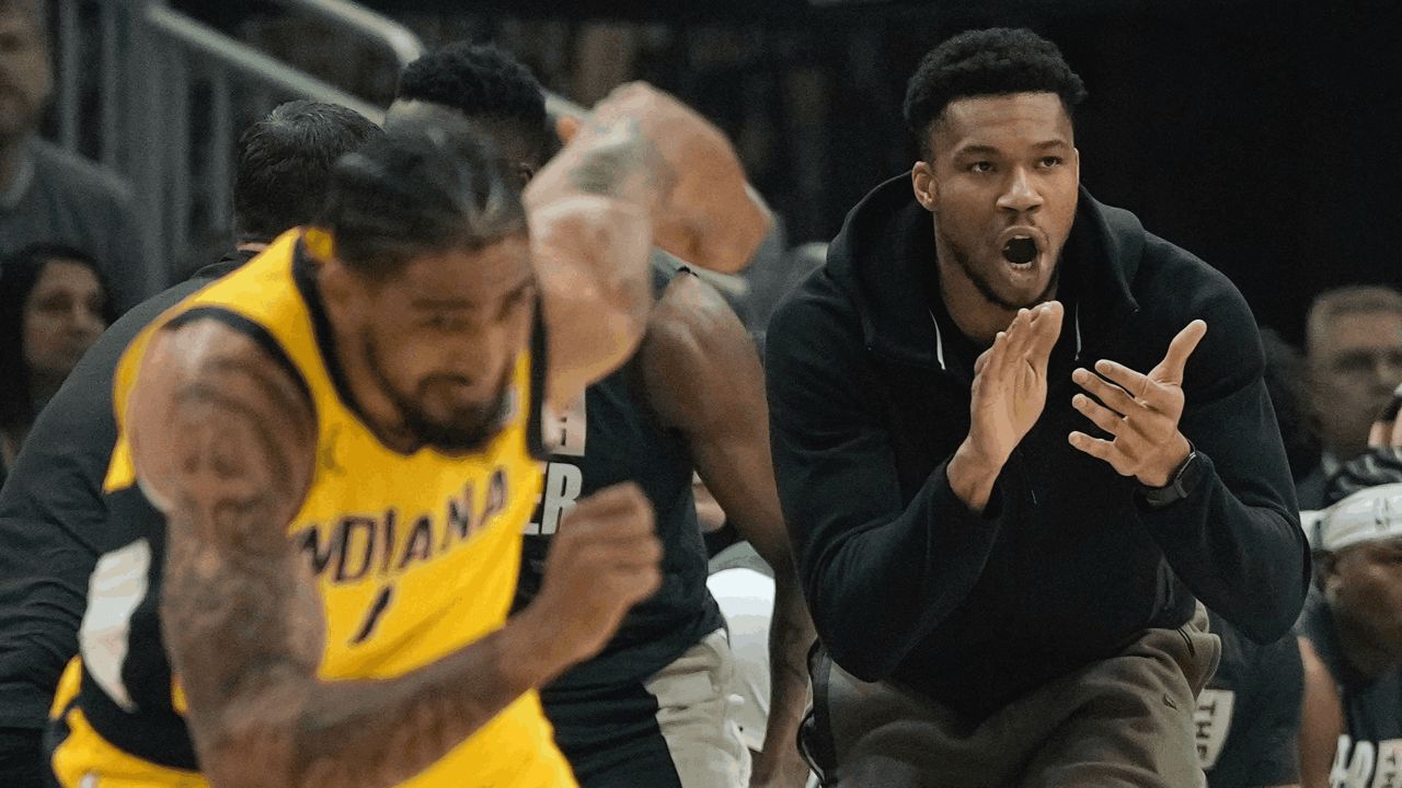 Milwaukee Bucks' Giannis Antetokounmpo reacts from the bench during the first half of Game 1 of the NBA playoff basketball game Sunday, April 21, 2024, in Milwaukee. (AP Photo/Morry Gash)